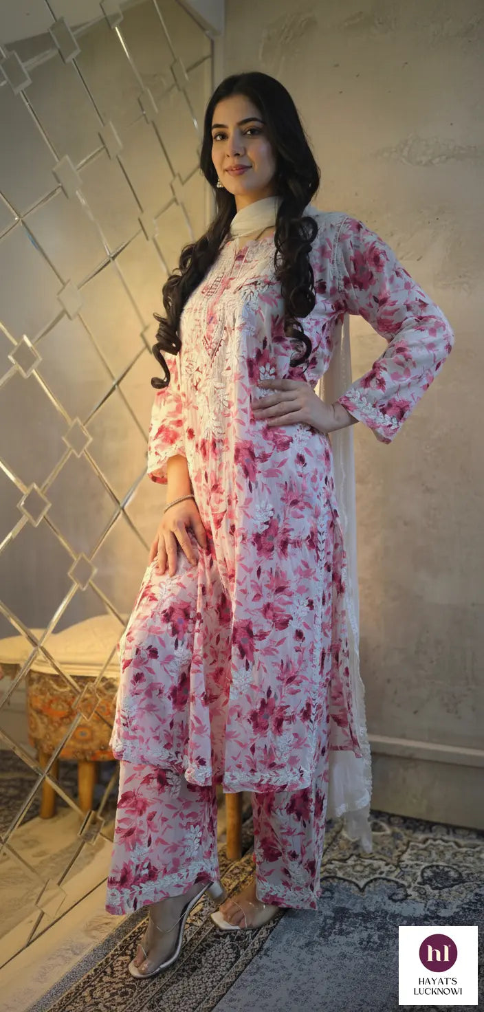 
Farheen pink chikankari printed mul mul set featuring soft breathable fabric, delicate printed detailing, and elegant traditional styling for graceful everyday ethnic wear by Hayat's Lucknowi.
