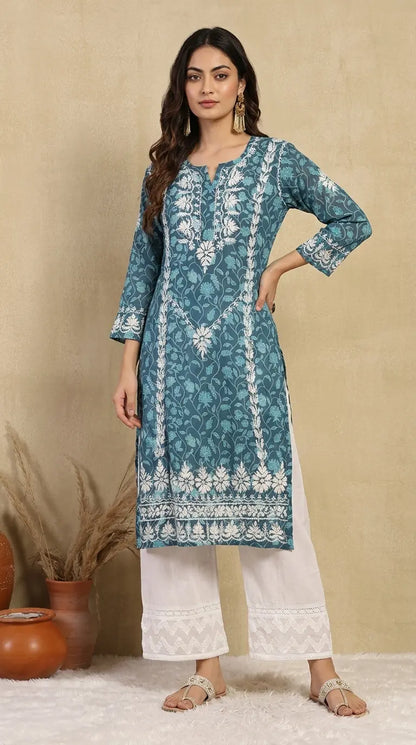 
Fariha blue mul mul Lucknowi chikankari kurta featuring delicate hand embroidery and soft breathable fabric for elegant everyday ethnic wear by Hayat's Lucknowi.
