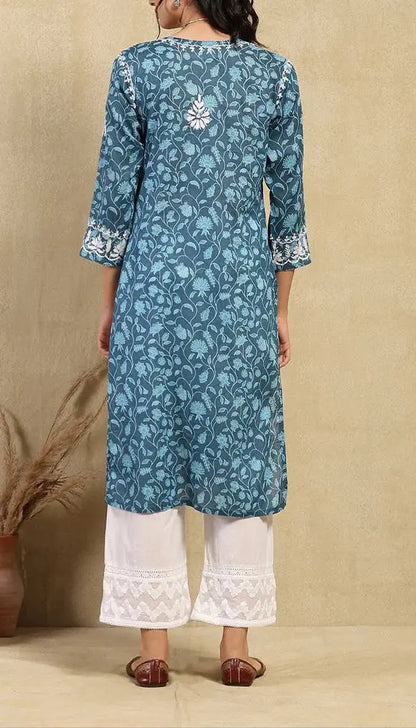 
Fariha blue mul mul Lucknowi chikankari kurta featuring delicate hand embroidery and soft breathable fabric for elegant everyday ethnic wear by Hayat's Lucknowi.
