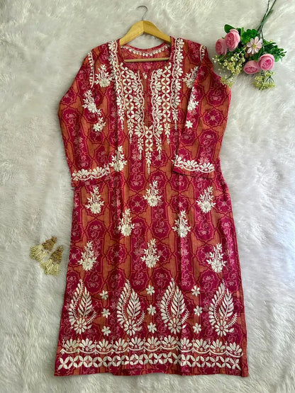 Fariha Pink Mul Mul Lucknowi Chikankari Kurta featuring intricate hand embroidery on lightweight, soft and breathable Mul Mul cotton fabric for an elegant everyday ethnic look by Hayat’s Lucknowi.
