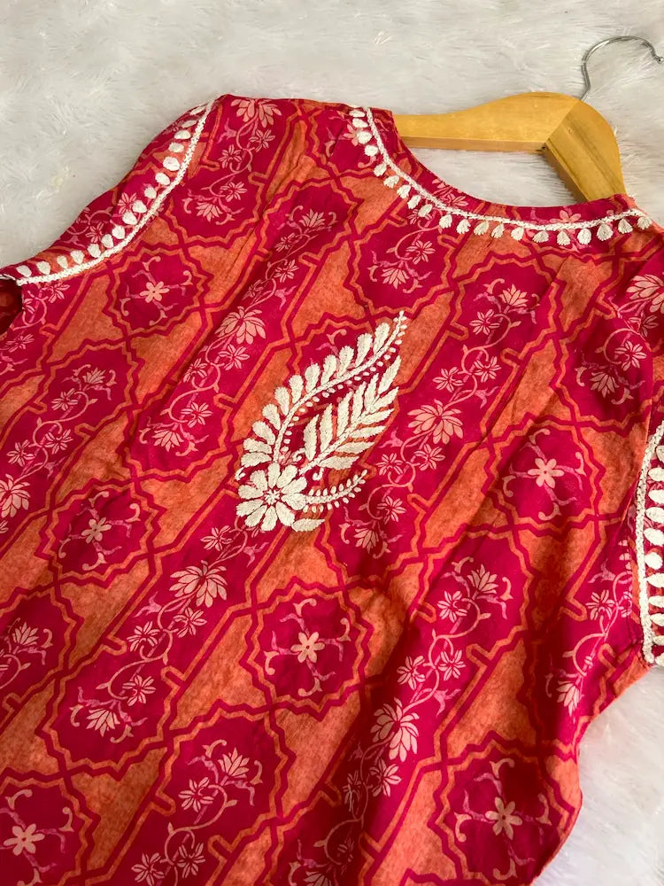 Fariha Pink Mul Mul Lucknowi Chikankari Kurta featuring intricate hand embroidery on lightweight, soft and breathable Mul Mul cotton fabric for an elegant everyday ethnic look by Hayat’s Lucknowi.
