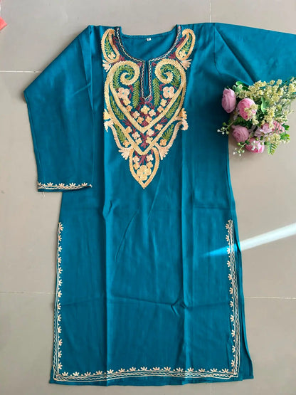 
Frozi blue cotton Kashmiri mid-length embroidered kurta featuring intricate traditional Kashmiri embroidery and soft breathable cotton fabric for elegant everyday ethnic wear by Hayat's Lucknowi.
