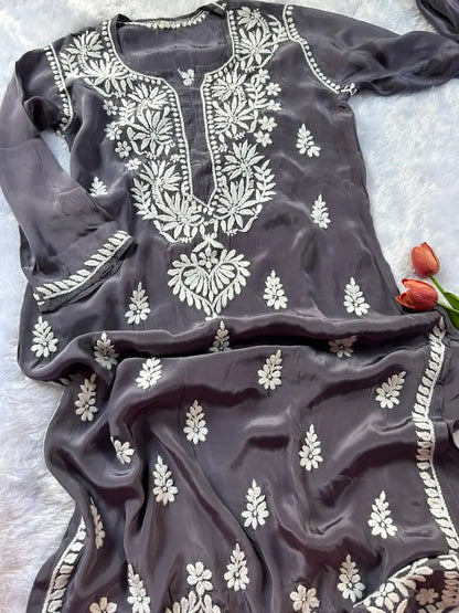 
Gray crepe silk chikankari kurta featuring delicate hand embroidery for a graceful and elegant ethnic look by Hayat's Lucknowi
