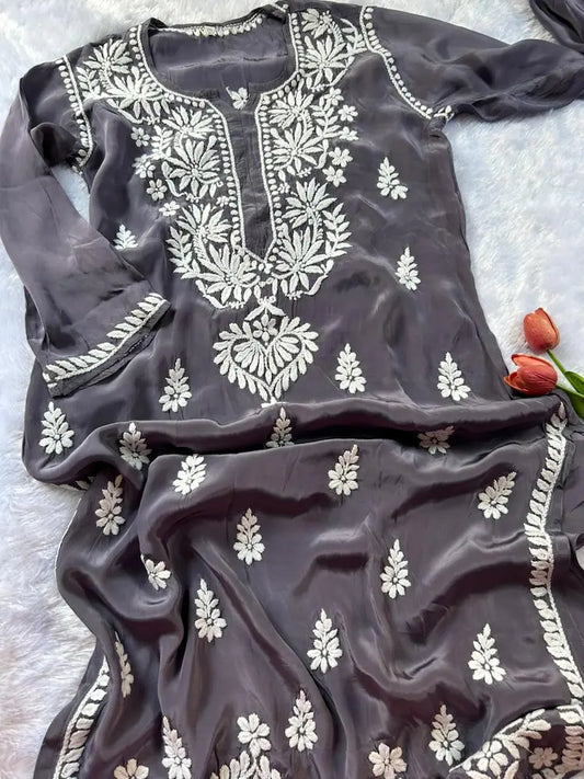 
Gray crepe silk chikankari kurta featuring delicate hand embroidery for a graceful and elegant ethnic look by Hayat's Lucknowi
