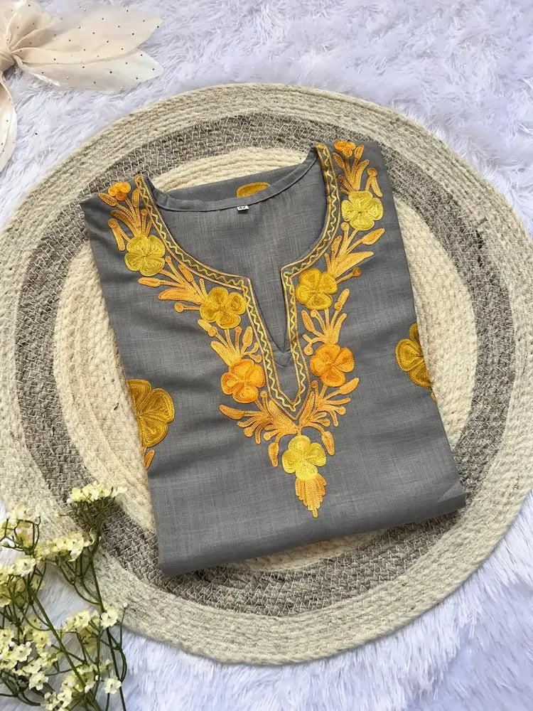 Gray Kashmiri long kurta with yellow embroidery by Hayat’s Lucknowi