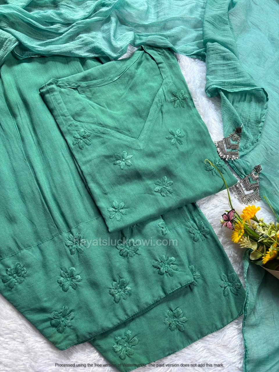 

Sage Green Rayon Chikankari Farshi Set featuring intricate hand embroidery on soft rayon fabric for a graceful traditional and festive look by Hayat’s Lucknowi.
