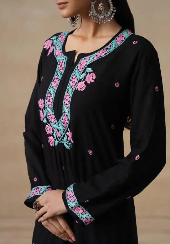 
Black modal chikankari kurta set designed with elegant traditional craftsmanship by Hayat's Lucknowi
