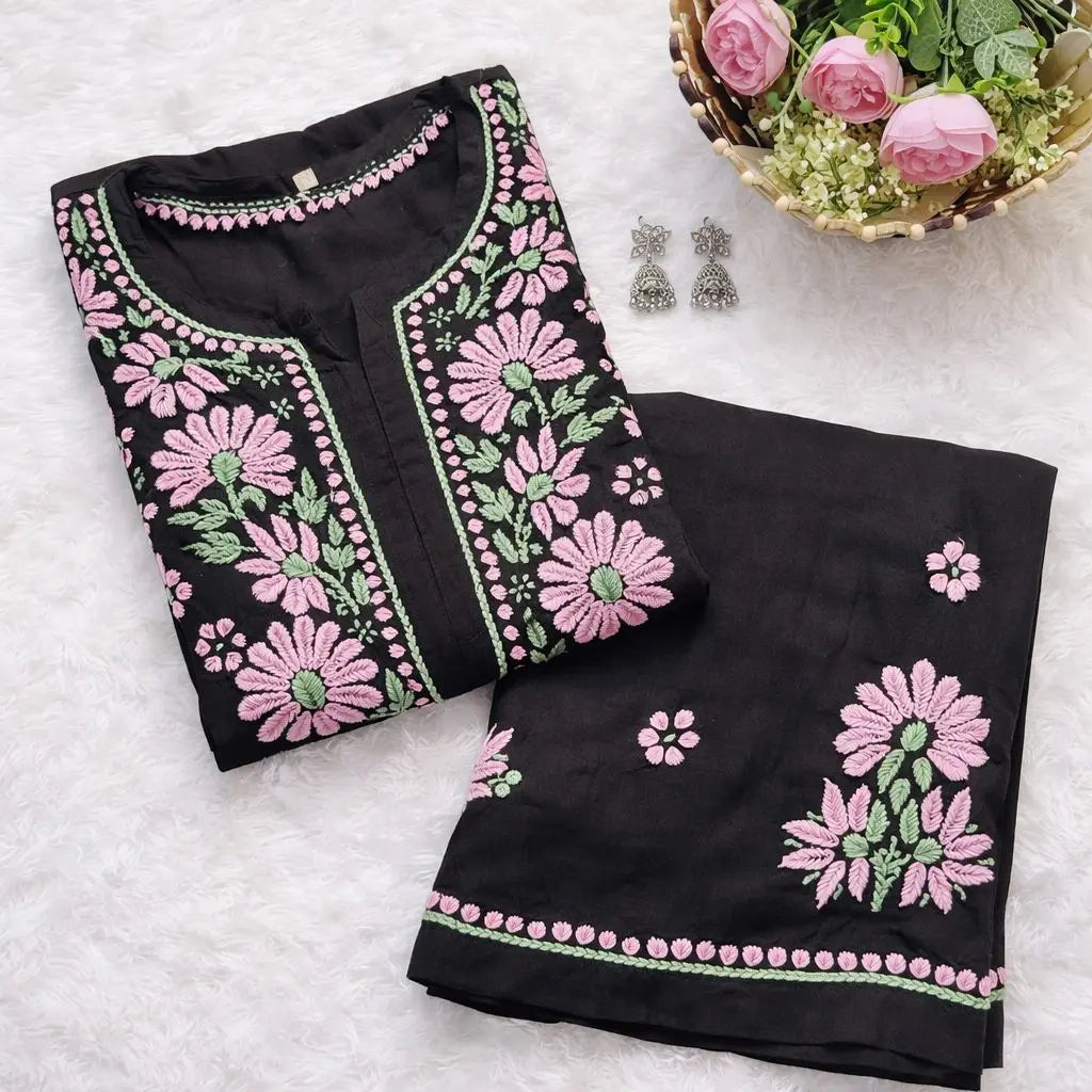 
Black rayon chikankari kurta set with dupatta showcasing intricate hand embroidery by Hayat's Lucknowi
