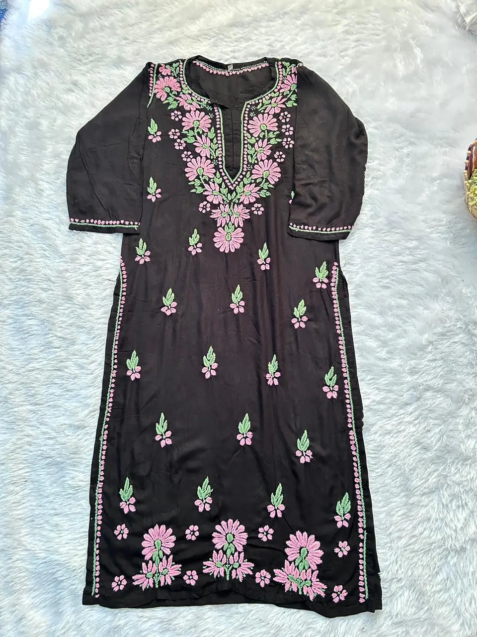 
Black rayon chikankari kurta set with dupatta showcasing intricate hand embroidery by Hayat's Lucknowi

