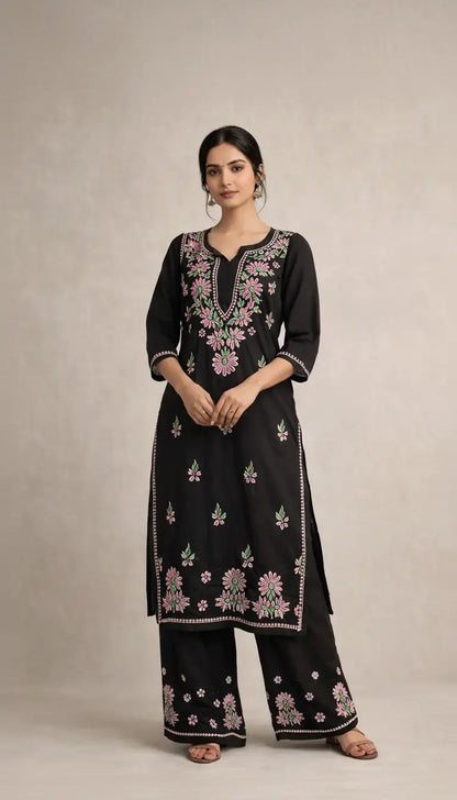 
Black rayon chikankari kurta set with dupatta showcasing intricate hand embroidery by Hayat's Lucknowi
