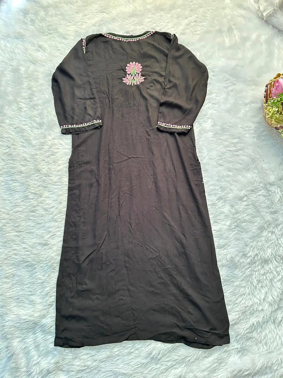 
Black rayon chikankari kurta set with dupatta showcasing intricate hand embroidery by Hayat's Lucknowi
