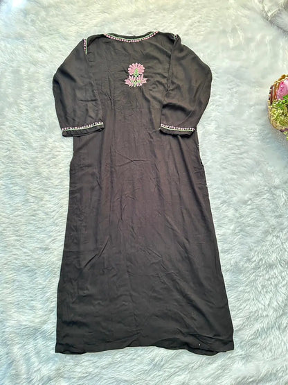 
Black rayon chikankari kurta set with dupatta showcasing intricate hand embroidery by Hayat's Lucknowi
