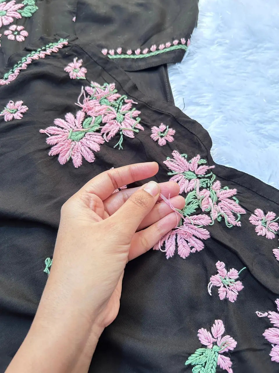 
Black rayon chikankari kurta set with dupatta showcasing intricate hand embroidery by Hayat's Lucknowi

