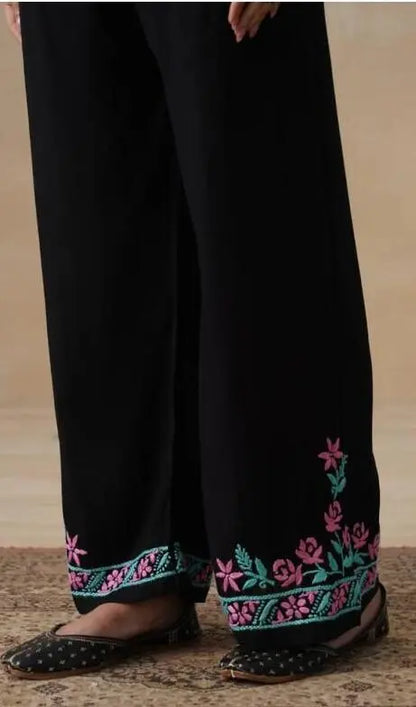 
Black modal chikankari kurta set designed with elegant traditional craftsmanship by Hayat's Lucknowi
