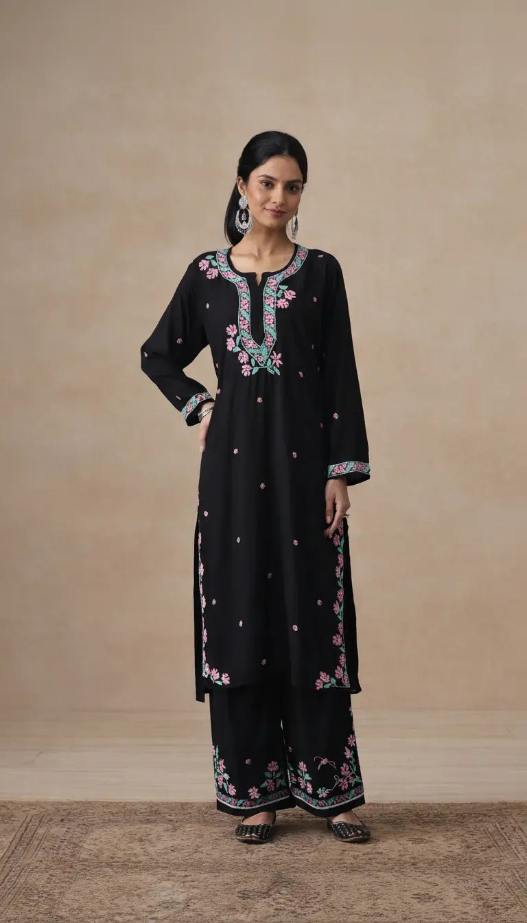 
Black modal chikankari kurta set designed with elegant traditional craftsmanship by Hayat's Lucknowi
