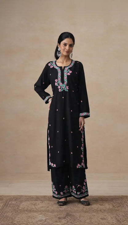 
Black modal chikankari kurta set designed with elegant traditional craftsmanship by Hayat's Lucknowi
