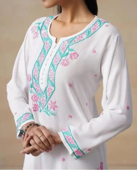 
Gul Noor white modal Lucknowi chikankari kurta set featuring intricate hand embroidery and graceful detailing for elegant ethnic wear by Hayat's Lucknowi
