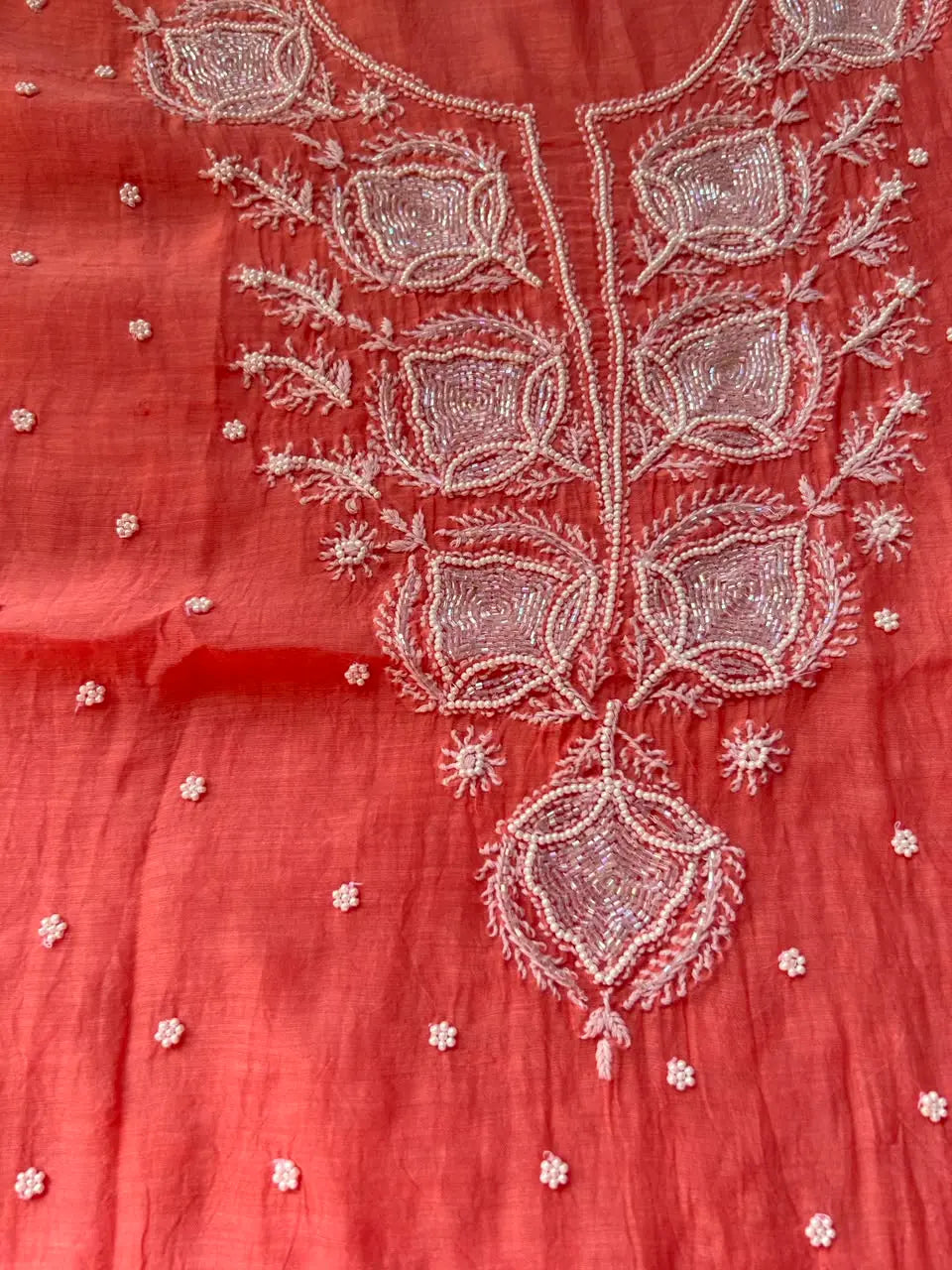 
Gul women's peach mul Chanderi handwork kurta and dupatta unstitched suit featuring intricate handcrafted detailing and elegant traditional craftsmanship for graceful festive and ethnic wear by Hayat's Lucknowi.
