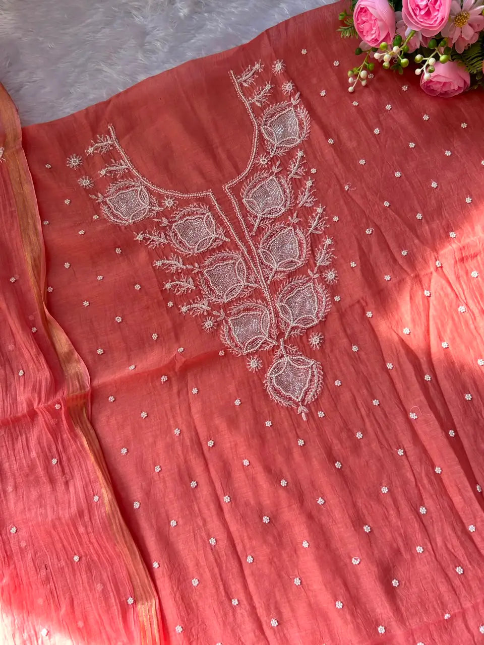 
Gul women's peach mul Chanderi handwork kurta and dupatta unstitched suit featuring intricate handcrafted detailing and elegant traditional craftsmanship for graceful festive and ethnic wear by Hayat's Lucknowi.

