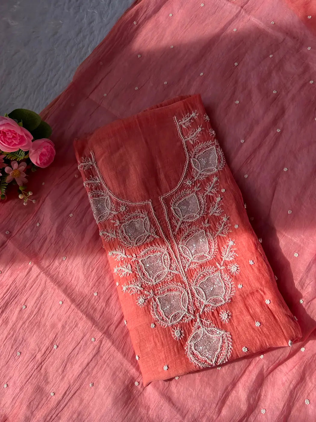 
Gul women's peach mul Chanderi handwork kurta and dupatta unstitched suit featuring intricate handcrafted detailing and elegant traditional craftsmanship for graceful festive and ethnic wear by Hayat's Lucknowi.
