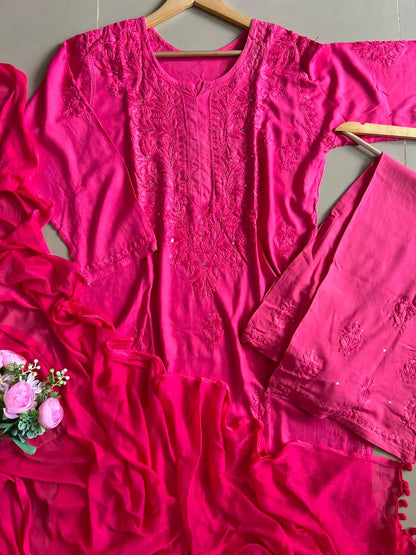 
Nagma hot pink rayon Lucknowi Mukesh chikankari set with dupatta featuring intricate hand embroidery and shimmering Mukesh work for vibrant festive and ethnic wear by Hayat's Lucknowi.
