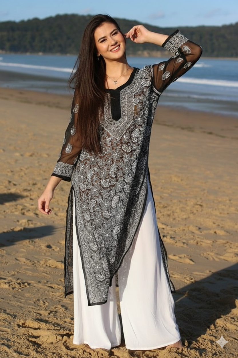 Black georgette chikankari kurti with embroidery details by Hayat’s Lucknowi