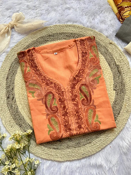 
Soft peach Kashmiri long kurta featuring handcrafted traditional detailing by Hayat's Lucknowi
