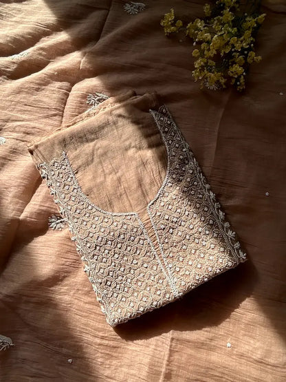 
Khazra women's brown mul Chanderi handwork kurta and dupatta unstitched suit featuring intricate handcrafted detailing and elegant traditional craftsmanship for timeless ethnic wear by Hayat's Lucknowi.
