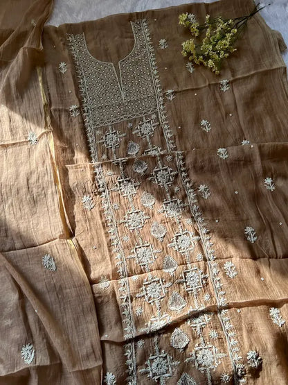 
Khazra women's brown mul Chanderi handwork kurta and dupatta unstitched suit featuring intricate handcrafted detailing and elegant traditional craftsmanship for timeless ethnic wear by Hayat's Lucknowi.
