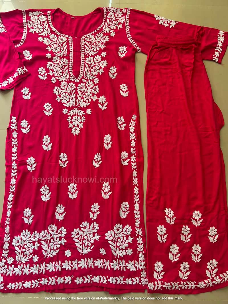 

Khushi Deep Pink Rayon Lucknowi Chikankari Kurta Set featuring intricate hand embroidery on soft rayon fabric for an elegant festive and ethnic look by Hayat’s Lucknowi.
