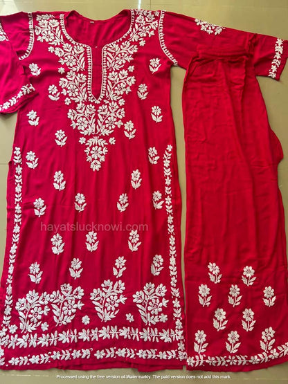 

Khushi Deep Pink Rayon Lucknowi Chikankari Kurta Set featuring intricate hand embroidery on soft rayon fabric for an elegant festive and ethnic look by Hayat’s Lucknowi.

