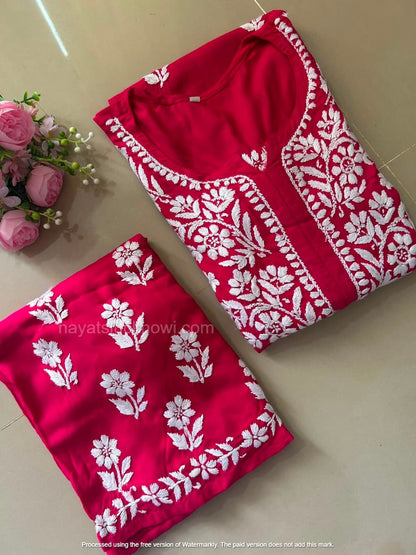
Khushi Deep Pink Rayon Lucknowi Chikankari Kurta Set featuring intricate hand embroidery on soft rayon fabric for an elegant festive and ethnic look by Hayat’s Lucknowi.
