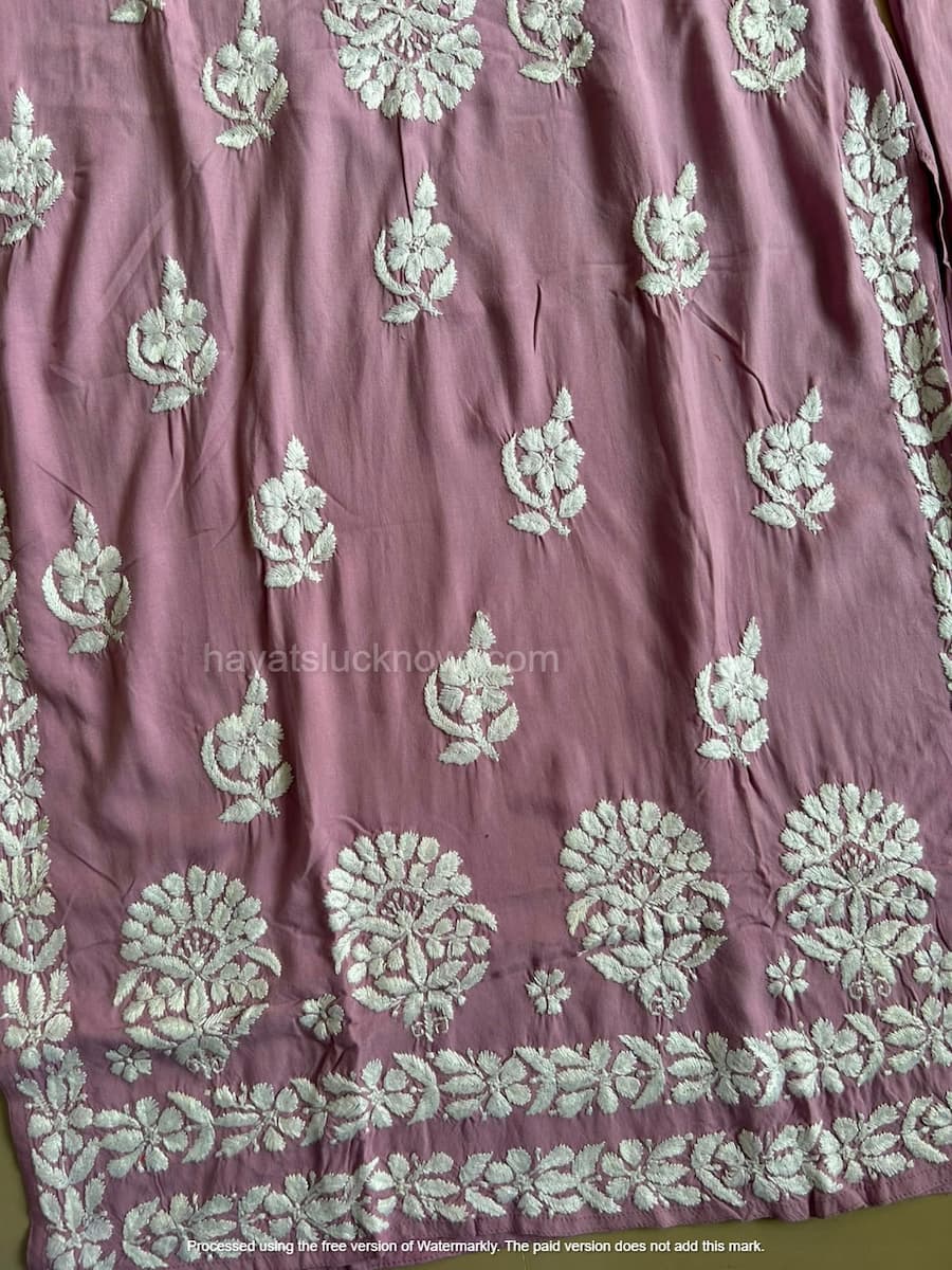 

Khushi Dusty Mauve Rayon Lucknowi Chikankari Kurta Set featuring intricate hand embroidery on soft rayon fabric for an elegant festive and ethnic look by Hayat’s Lucknowi.
