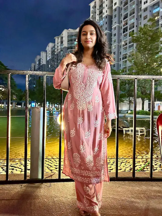 
Khushi nude pink rayon Lucknowi chikankari kurta set featuring delicate hand embroidery and elegant traditional craftsmanship for soft, graceful ethnic wear by Hayat's Lucknowi.
