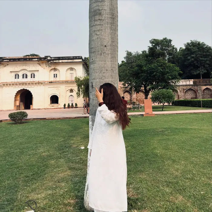Khushi white rayon Lucknowi Chikankari kurta set featuring intricate handcrafted white Chikankari embroidery on soft, breathable rayon fabric for elegant everyday and festive ethnic wear by Hayat's Lucknowi.
