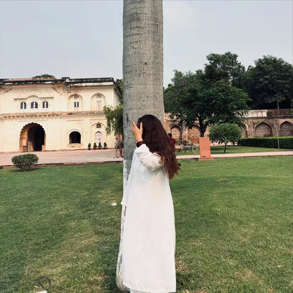 Khushi white rayon Lucknowi Chikankari kurta set featuring intricate handcrafted white Chikankari embroidery on soft, breathable rayon fabric for elegant everyday and festive ethnic wear by Hayat's Lucknowi.
