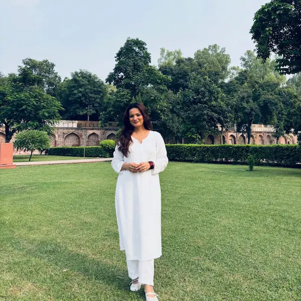 Khushi white rayon Lucknowi Chikankari kurta set featuring intricate handcrafted white Chikankari embroidery on soft, breathable rayon fabric for elegant everyday and festive ethnic wear by Hayat's Lucknowi.
