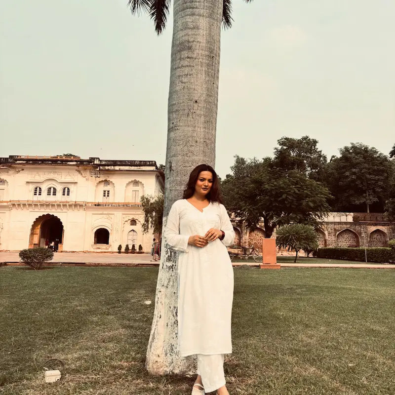 Khushi white rayon Lucknowi Chikankari kurta set featuring intricate handcrafted white Chikankari embroidery on soft, breathable rayon fabric for elegant everyday and festive ethnic wear by Hayat's Lucknowi.
