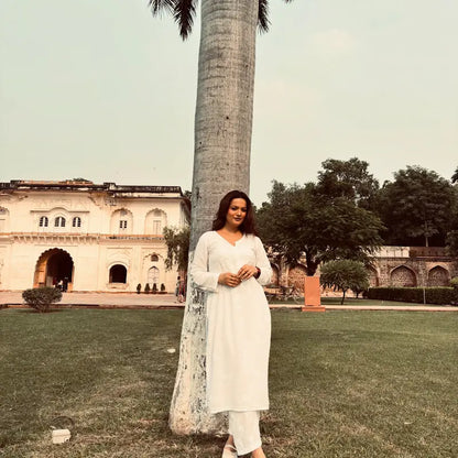 Khushi white rayon Lucknowi Chikankari kurta set featuring intricate handcrafted white Chikankari embroidery on soft, breathable rayon fabric for elegant everyday and festive ethnic wear by Hayat's Lucknowi.
