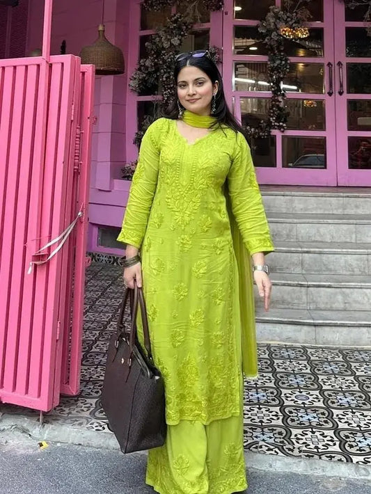 

Lavanya henna green Lucknowi Chikankari kurta set with dupatta featuring exquisite handcrafted Chikankari embroidery on soft breathable fabric for festive, casual, and elegant ethnic wear by Hayat's Lucknowi.
