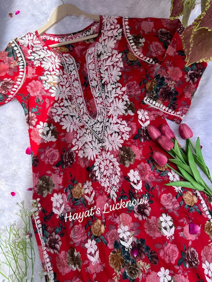 Red mul mul kurta with chikankari embroidery by Hayat’s Lucknowi