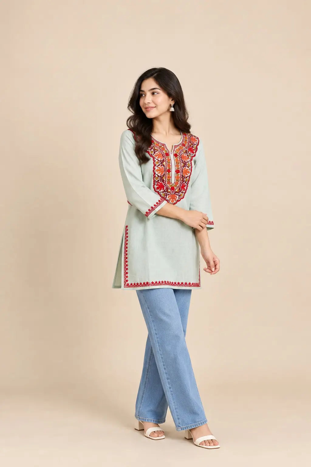 Mint Green Cotton Kashmiri Short Embroidered Kurti featuring intricate traditional Kashmiri embroidery on soft, breathable cotton fabric for an elegant everyday ethnic look by Hayat’s Lucknowi.
