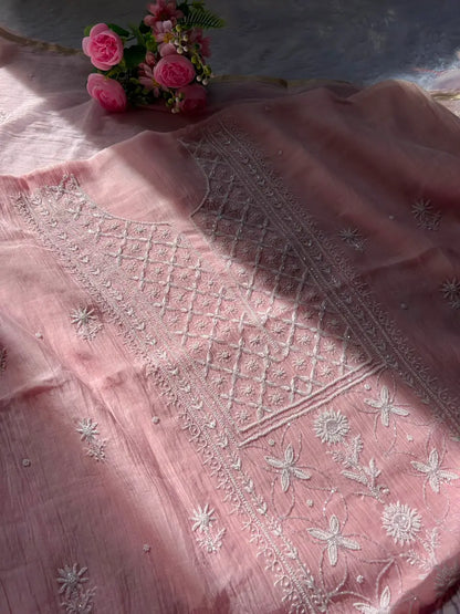 
Naaz women's pink mul Chanderi handwork kurta and dupatta unstitched suit featuring intricate handcrafted detailing and elegant traditional styling for festive ethnic wear by Hayat's Lucknowi
