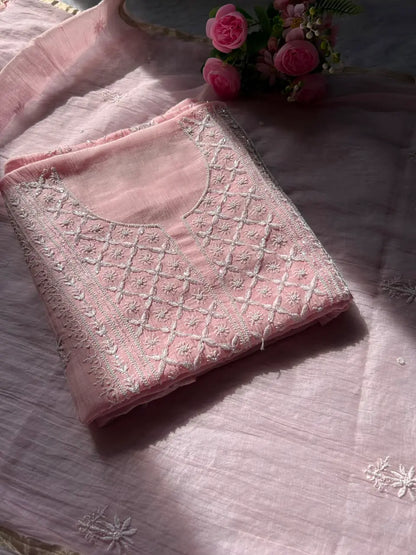 
Naaz women's pink mul Chanderi handwork kurta and dupatta unstitched suit featuring intricate handcrafted detailing and elegant traditional styling for festive ethnic wear by Hayat's Lucknowi
