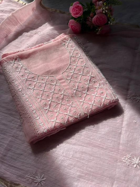 
Naaz women's pink mul Chanderi handwork kurta and dupatta unstitched suit featuring intricate handcrafted detailing and elegant traditional styling for festive ethnic wear by Hayat's Lucknowi
