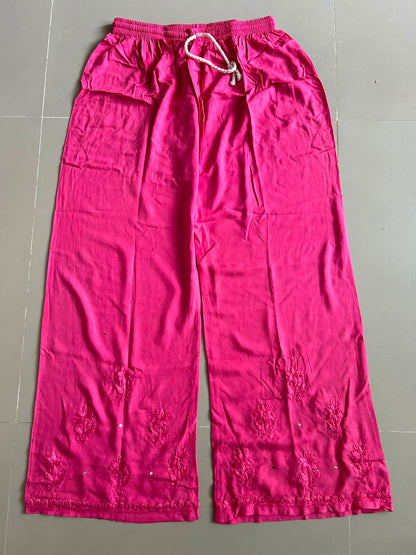 
Nagma hot pink rayon Lucknowi Mukesh chikankari set with dupatta featuring intricate hand embroidery and shimmering Mukesh work for vibrant festive and ethnic wear by Hayat's Lucknowi.
