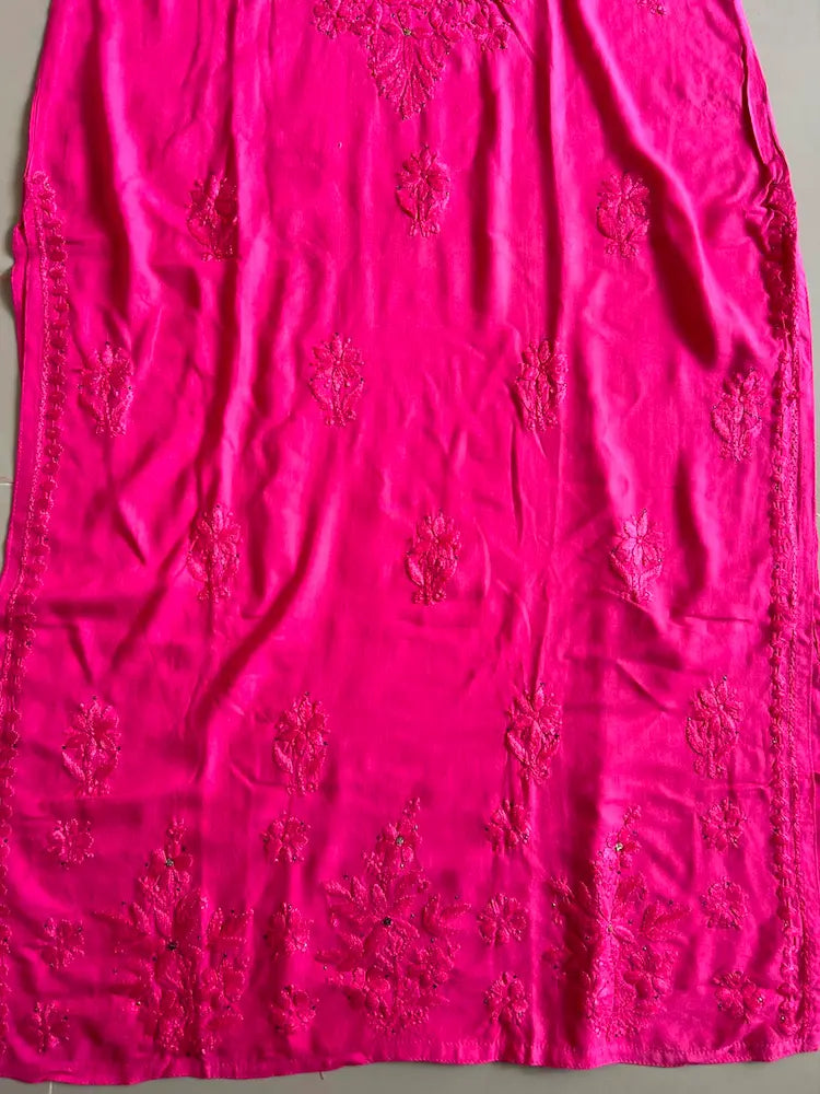 
Nagma hot pink rayon Lucknowi Mukesh chikankari set with dupatta featuring intricate hand embroidery and shimmering Mukesh work for vibrant festive and ethnic wear by Hayat's Lucknowi.
