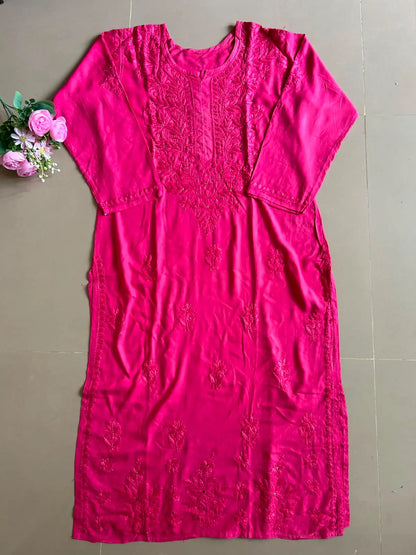 
Nagma hot pink rayon Lucknowi Mukesh chikankari set with dupatta featuring intricate hand embroidery and shimmering Mukesh work for vibrant festive and ethnic wear by Hayat's Lucknowi.
