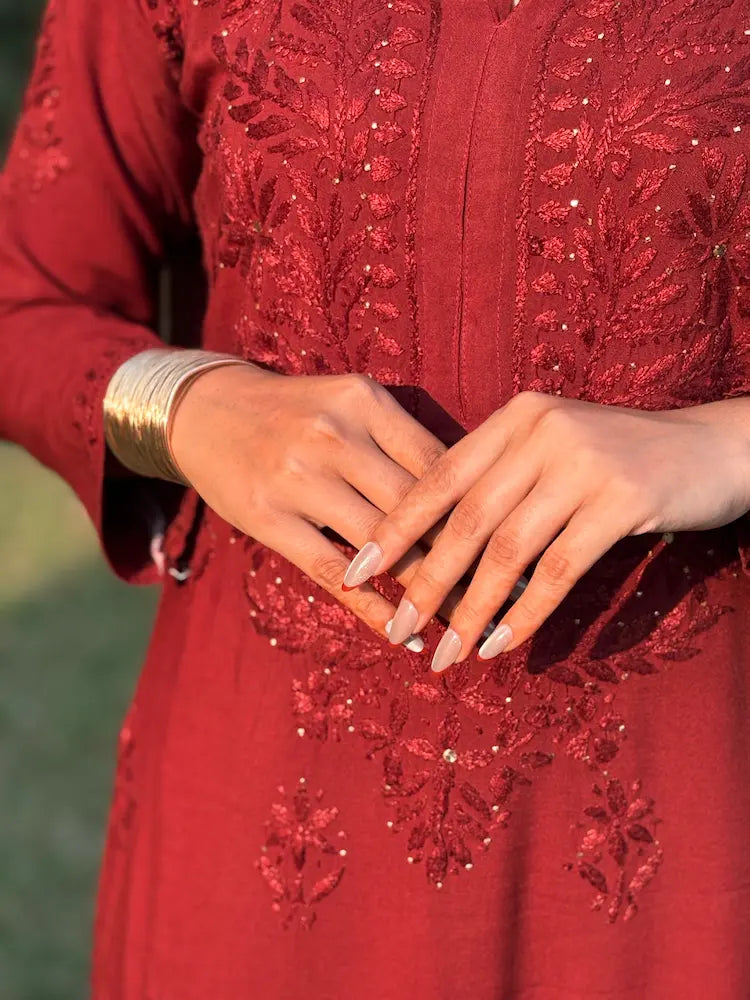 
Nagma maroon rayon Lucknowi chikankari set with dupatta featuring intricate mukesh work and elegant hand embroidery for festive ethnic wear by Hayat's Lucknowi