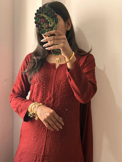 
Nagma maroon rayon Lucknowi chikankari set with dupatta featuring intricate mukesh work and elegant hand embroidery for festive ethnic wear by Hayat's Lucknowi